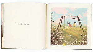 Pagina interna del libro, con due bimbe sotto l'altalena e la scritta "Era un posto dove sentirsi liberi". Il libro è delicato, ma profondo